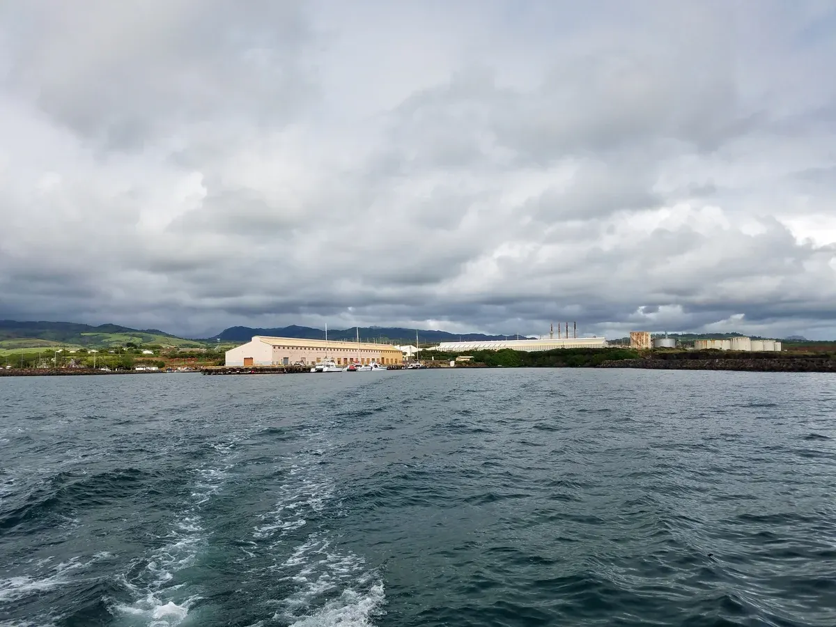 View of Port Allen harbor and Eleele from a boat leaving for Napali Coast boat tours on Kauai