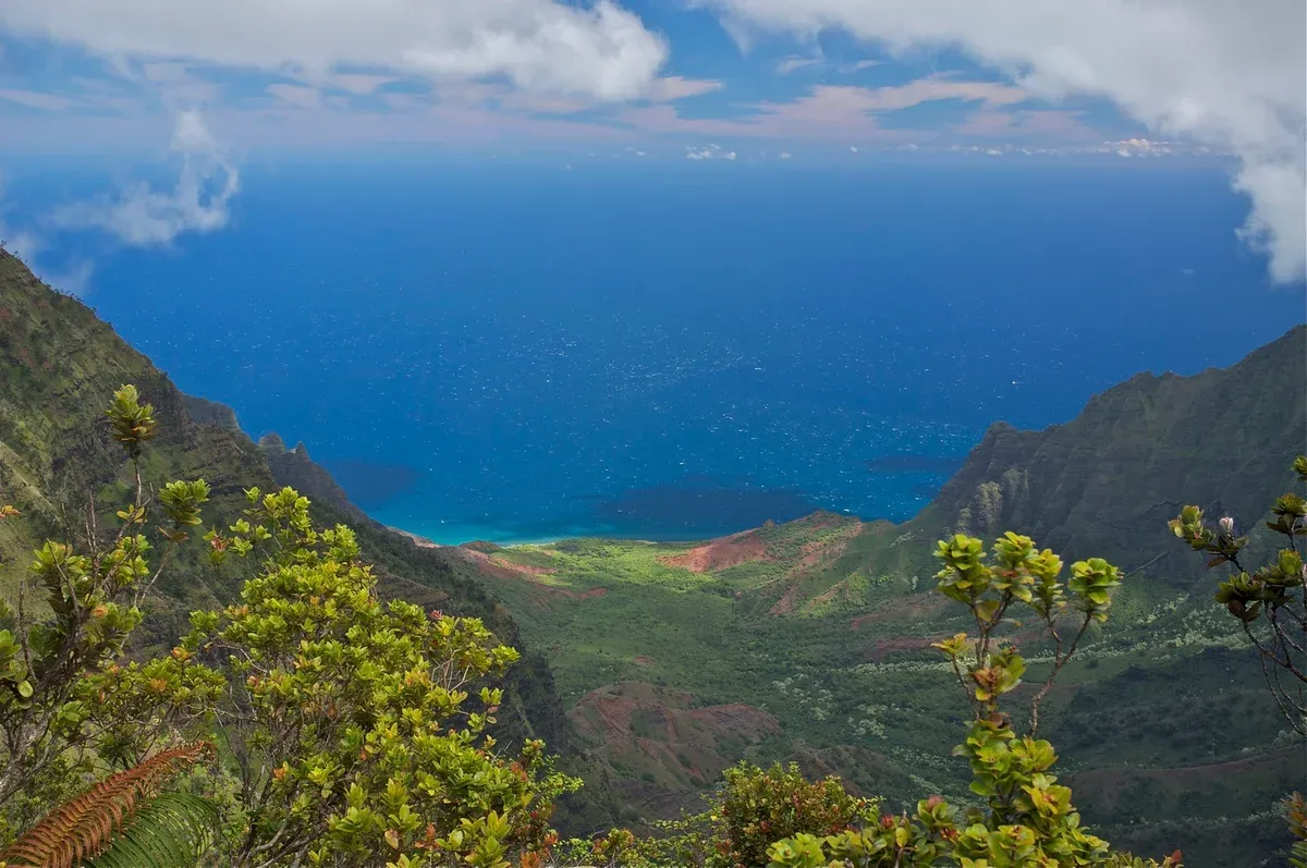 Kalalau Valley opening to the sea, the backdrop of Napali Coast boat tours