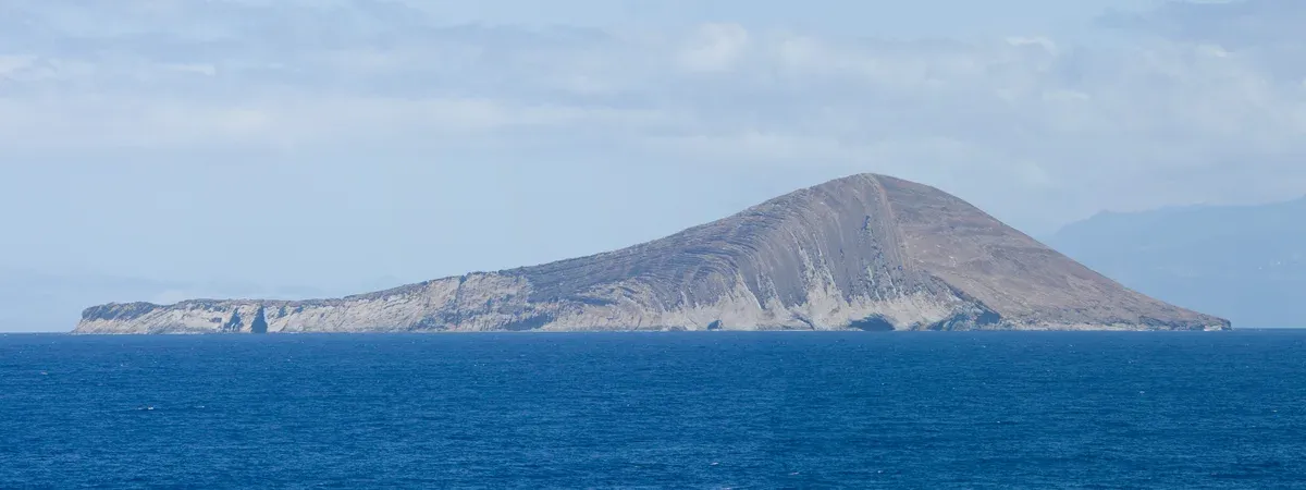 Lehua Island seen from the sea near Niihau on a Kauai Na Pali Coast and Niihau boat tour